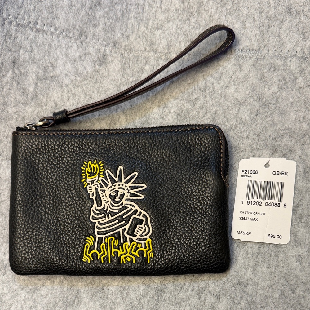 Coach Black Wristlet with Yellow Graphic
